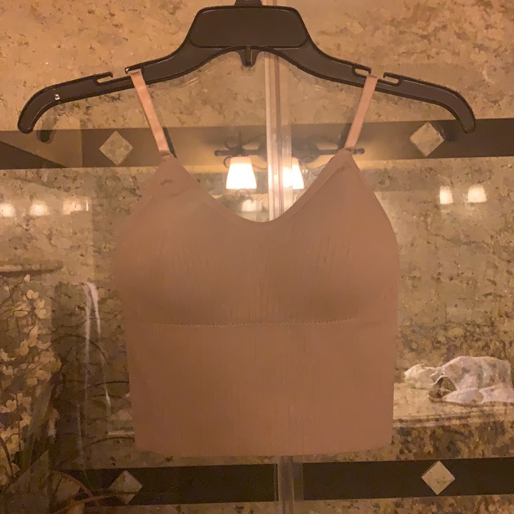 I’m selling 4 seamless rib-knit sports bra - Picture 3 of 4
